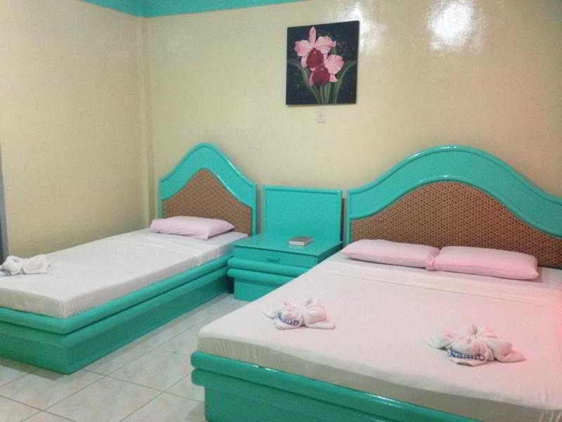 Queen\'S Beach Resort Manoc-Manoc Exterior foto